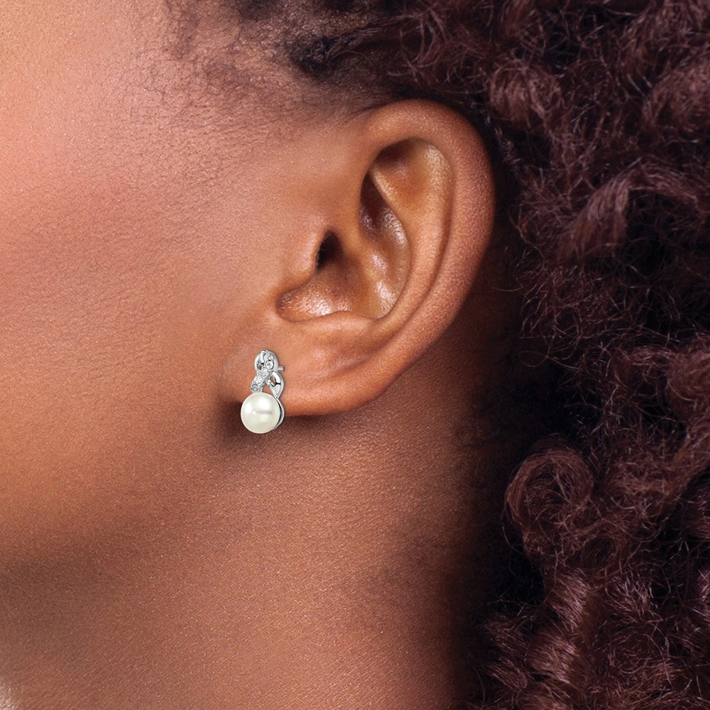 PSSE Sterling Silver Rhodium-plated 6-7mm White Button Freshwater Cultured Pearl and CZ Post Earrings